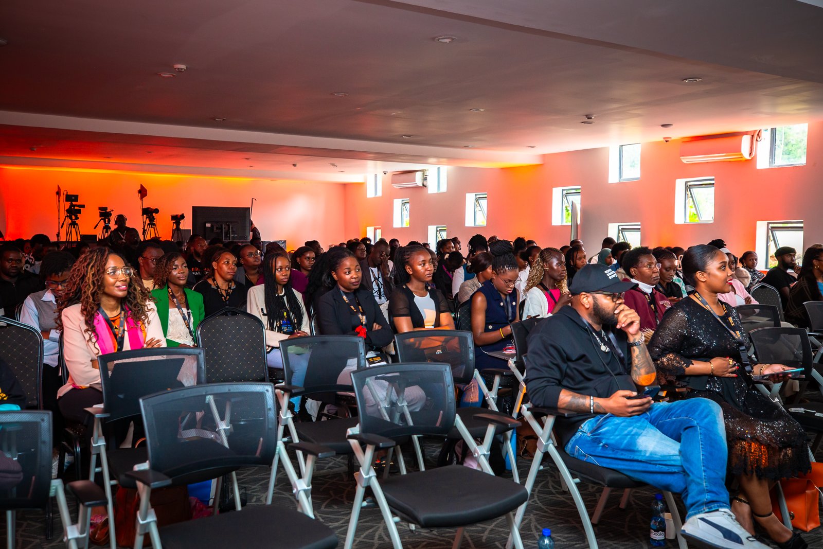 A packed audience seated in rows at the Bitcoin Nairobi Conference main hall